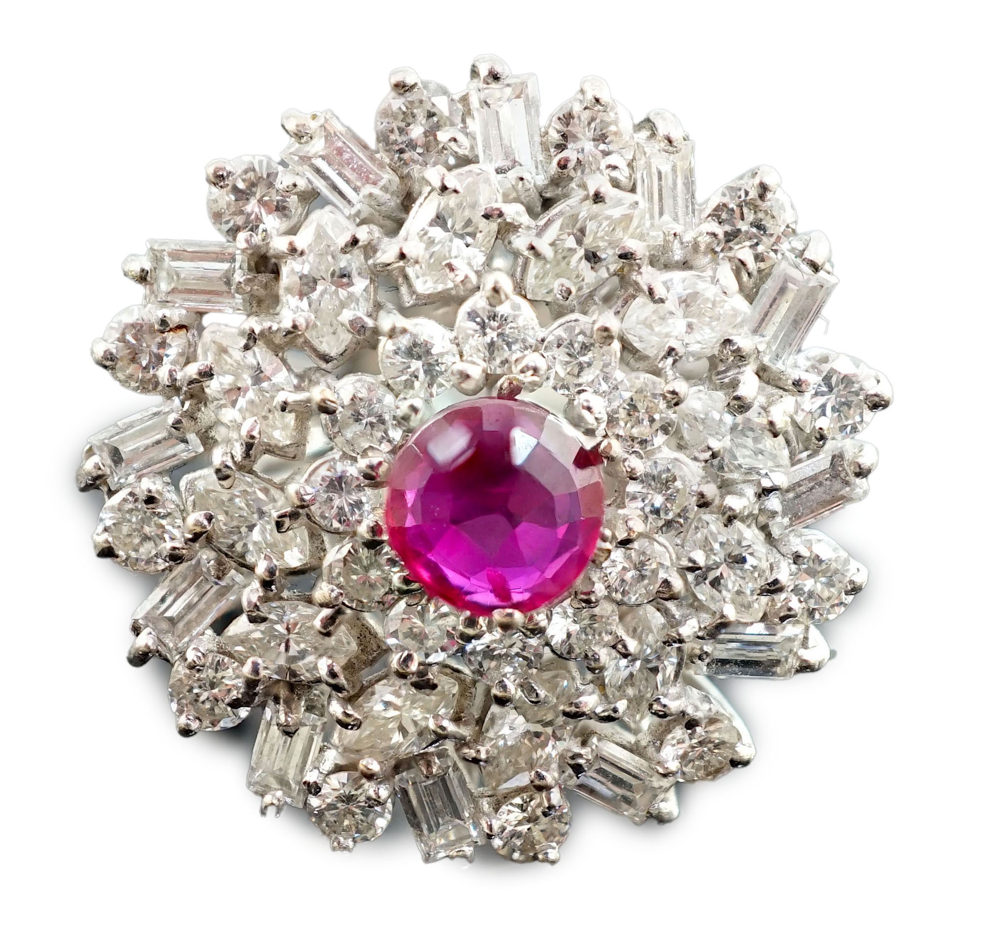 A modern 18ct white gold, ruby and round, baguette and marquise cut diamond cluster set dress ring